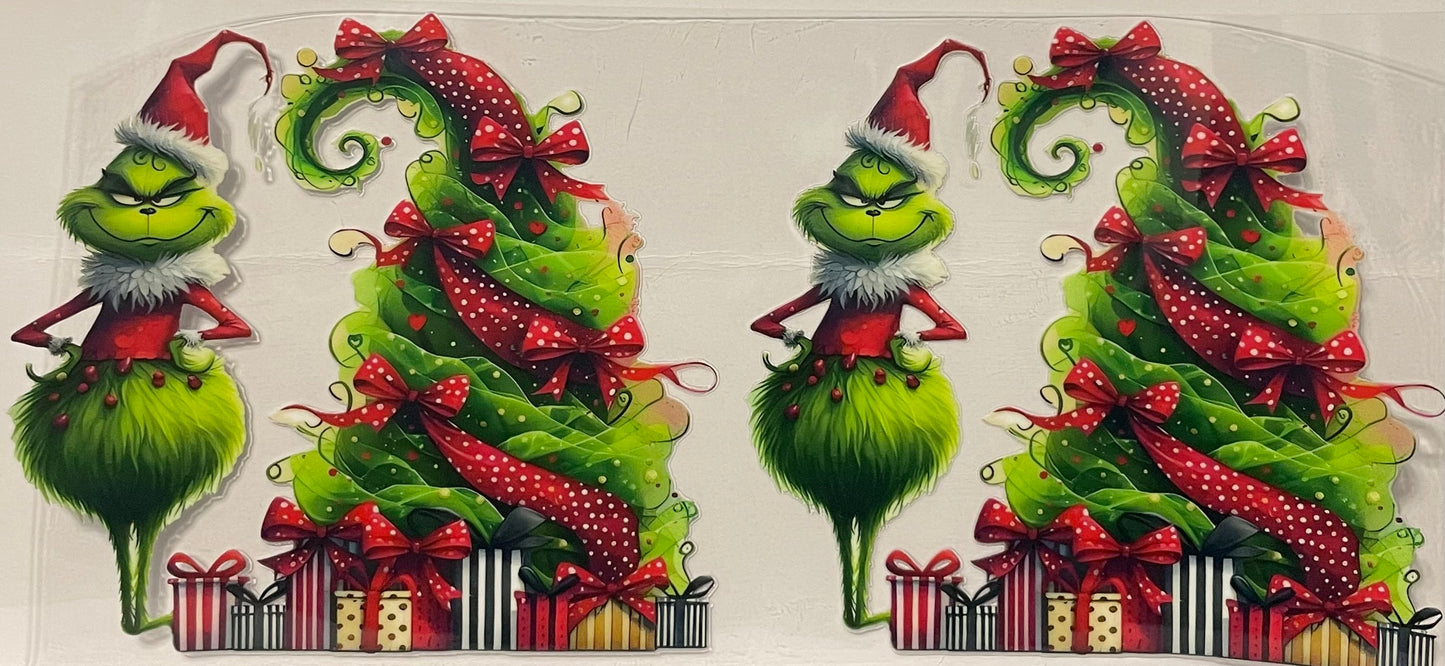 C33 - Grinch next to Large Christmas Tree