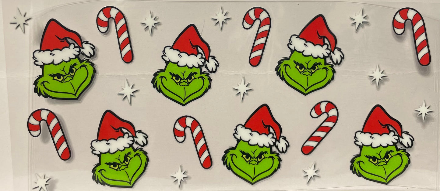 C31 - Grinch Faces with Candy Canes and Sparkle White Stars