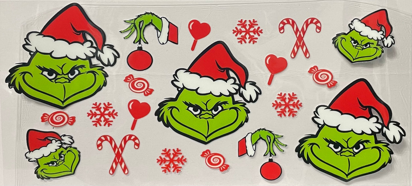 C40 - Grinch Faces with Santa Hat and Candy Floating